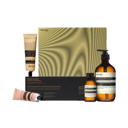 Aesop Resurrection Aromatique Hand Wash, Resurrection Aromatique Hand Balm, Geranium Leaf Body Cleanser & Rejuvenate Intensive Body Balm placed by majestic melody box