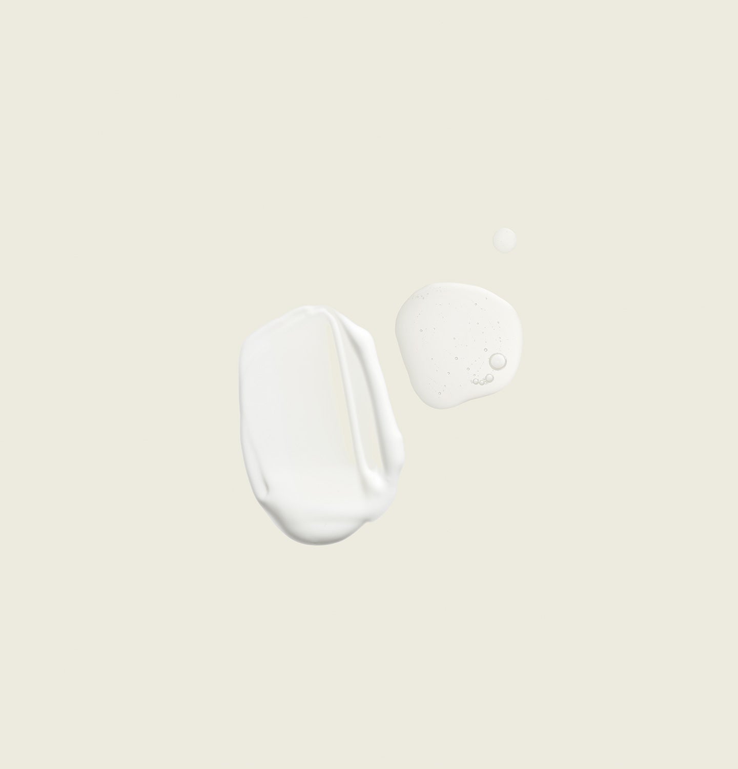 Swatch & droplet of Aesop Moroccan Neroli Shaving Duet - serum & lotion