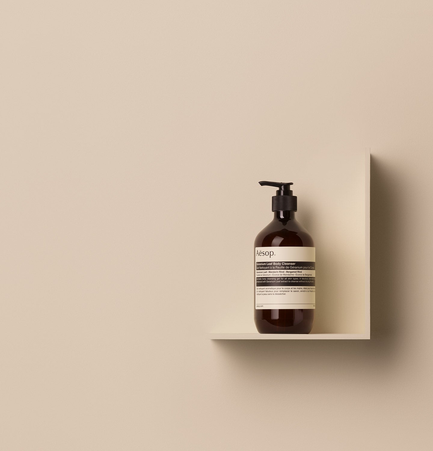 Bottle of Aesop Geranium Leaf Body Cleanser on a shelf