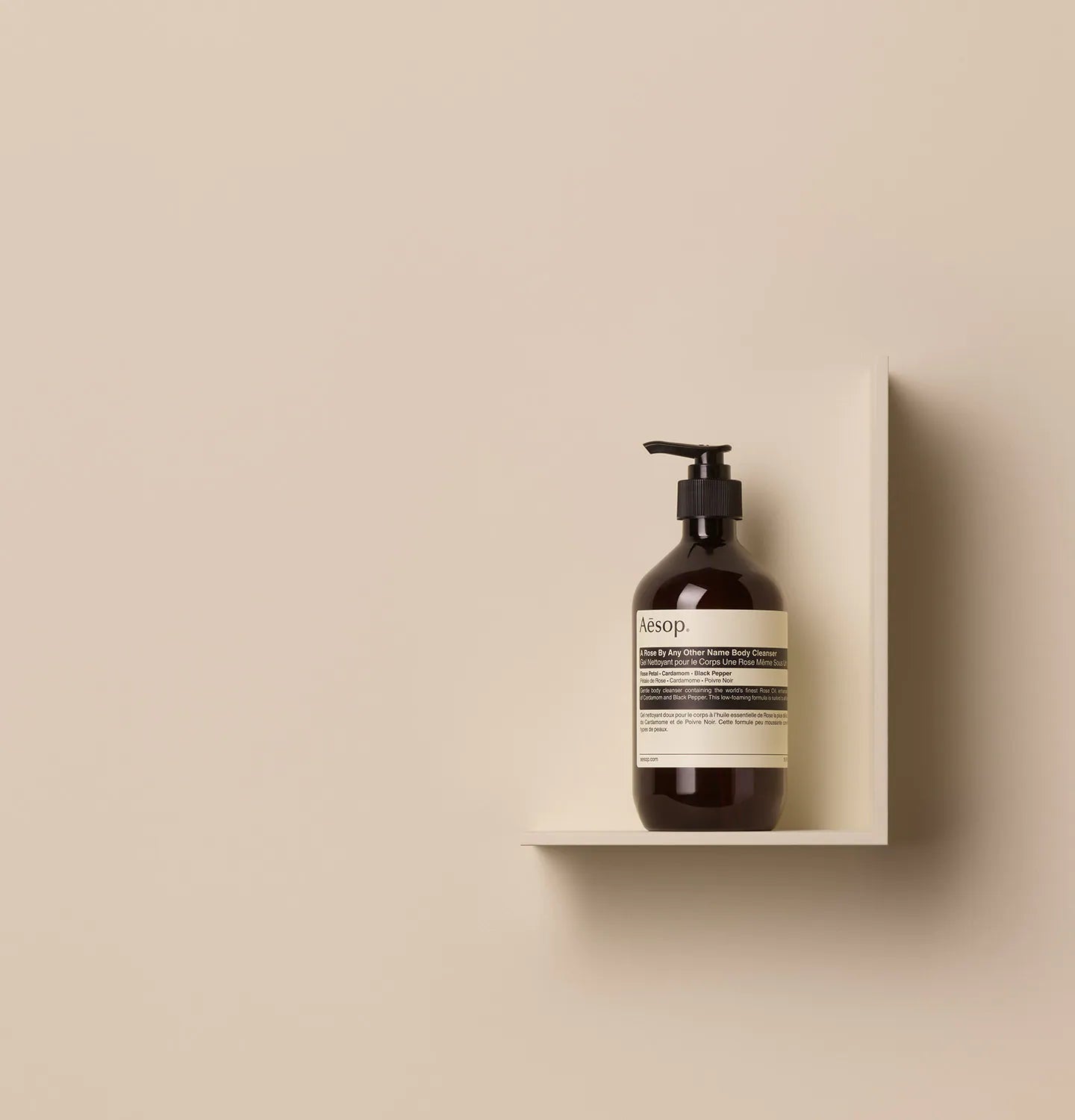 500ml bottle of Aesop A Rose By Any Other Name Body Cleanser placed on a shelf