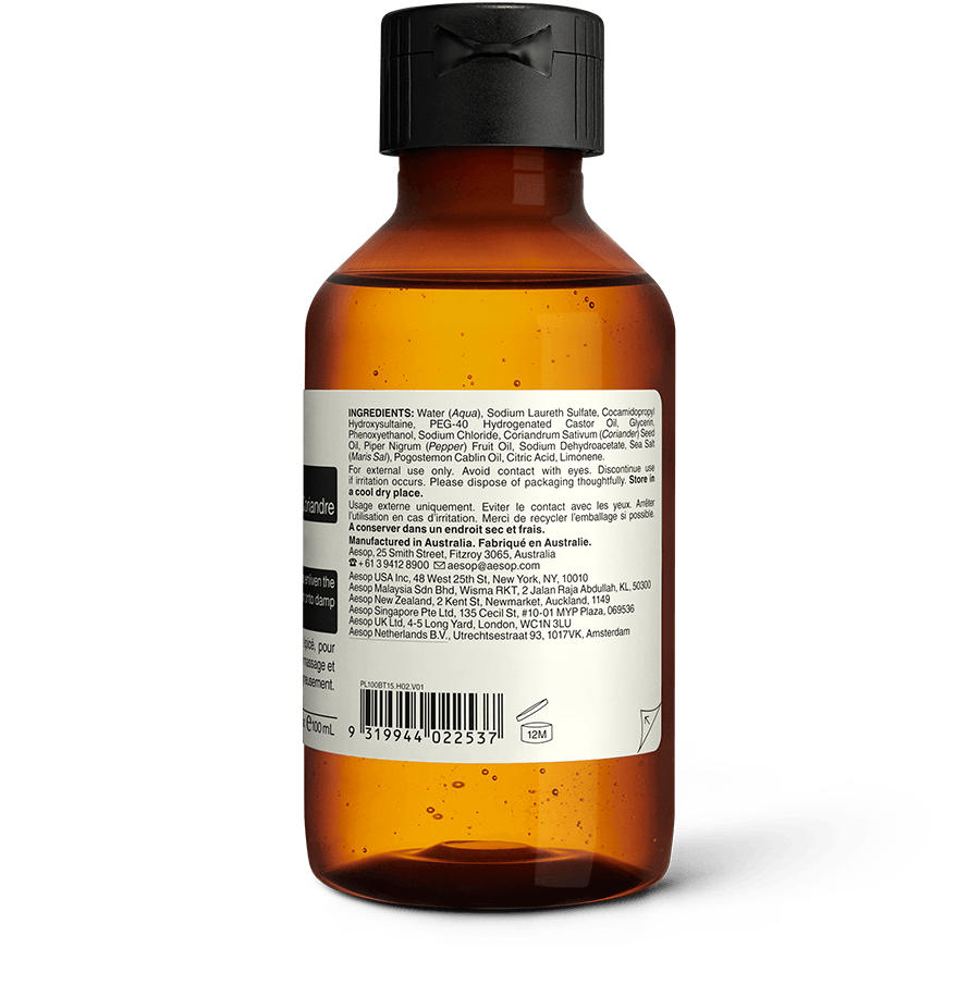Back of the 100ml bottle of Aesop Coriander Seed Body Cleanser displaying ingredients and manufacturing information