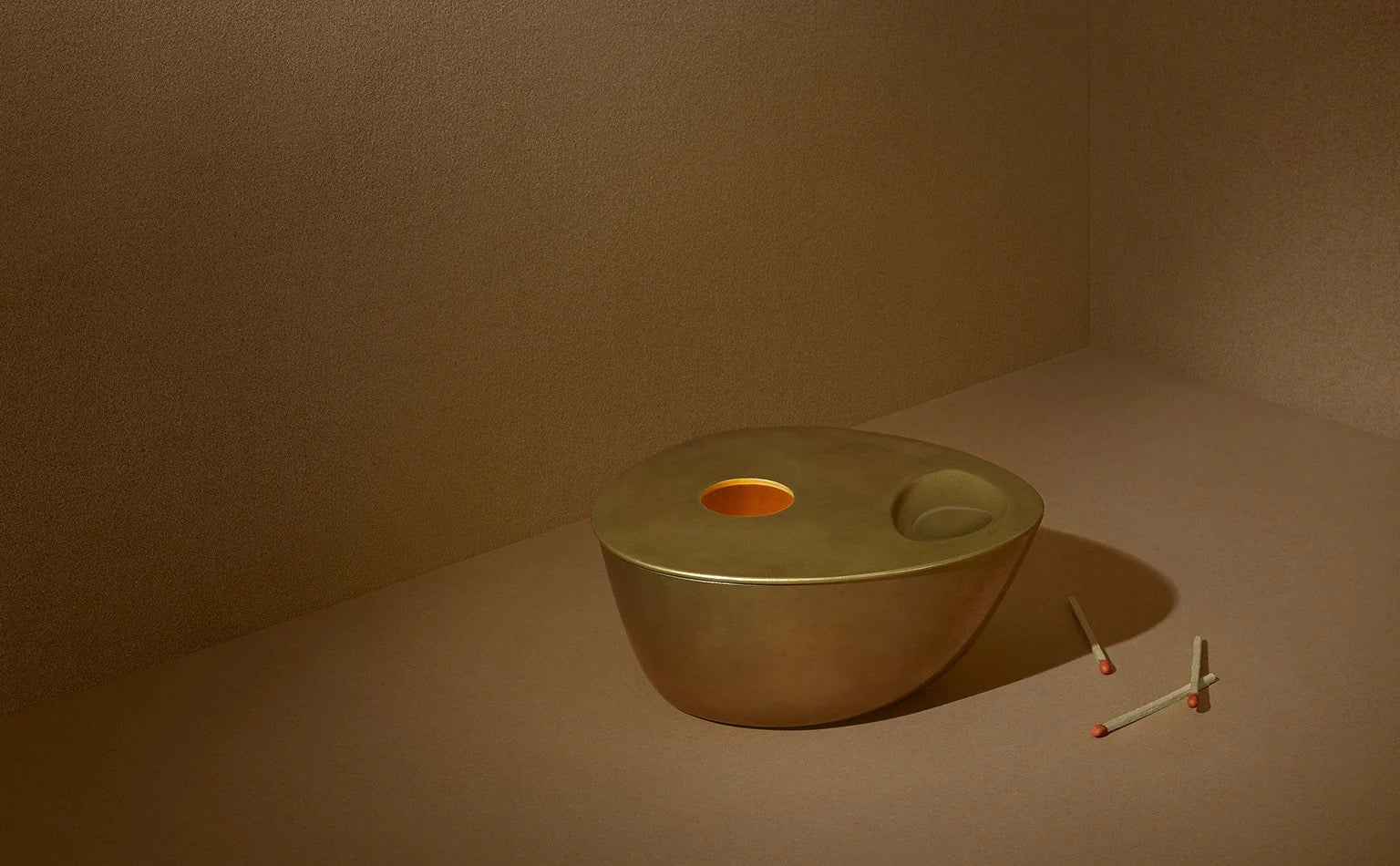 Aesop Brass Oil Burner in use
